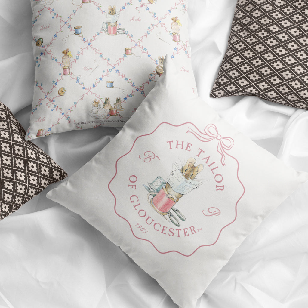 Mouse Sitting on a Reel of Pink String Cushion